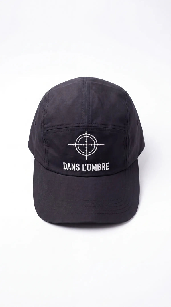 Casquette running noire DANS L'OMBRE — logo cible brodé, vue de face